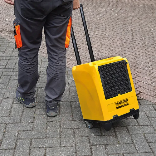 Master DHP20 dehumidifier with transport handle and wheels for easy site mobility