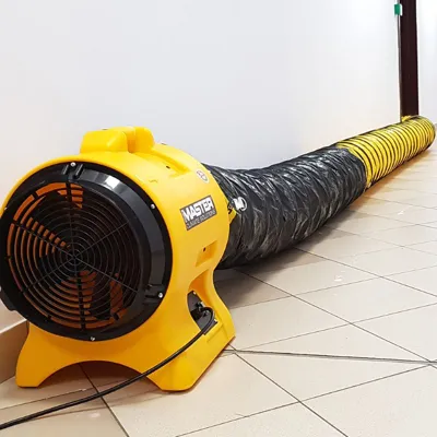 Master BL 6800 air circulator fan connected to ducting for targeted airflow drying