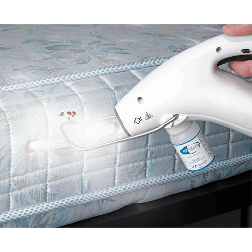 Polti Cimex Eradicator applying 180°C dry steam to a mattress for bed bug removal
