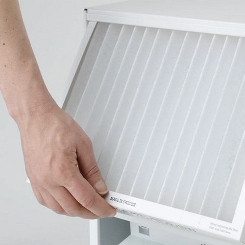 Close-up of the Wood’s SW42F dehumidifier filter being removed for maintenance