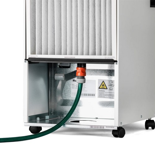 Hose connected to the Wood’s SW42F dehumidifier for continuous drainage