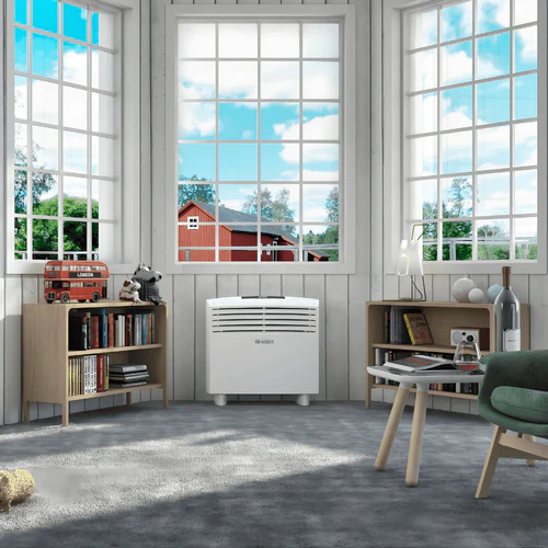 Olimpia Splendid Unico Easy S2 HP 2.0kW installed under window in living space